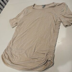 A New Day Medium. Nude/tan shirt with elastic on the sides